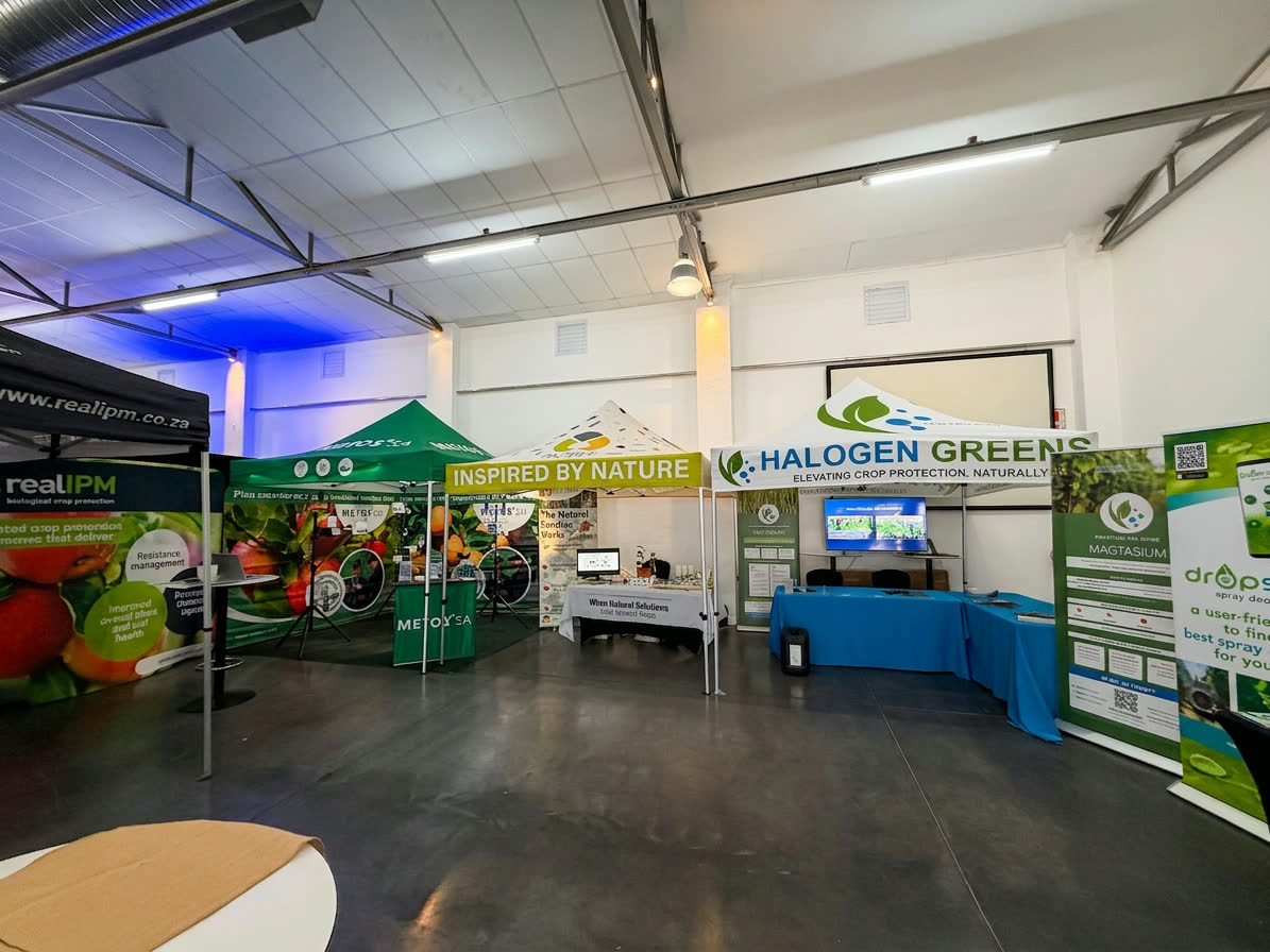 Vision Zero exhibitor hall at Allée Bleue with the Halogen Greens stand